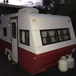 Red And White Pull Behind Camper 