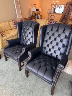 Pair of  traditional navy blue leather Chesterfield wingback armchairs - excellent condition