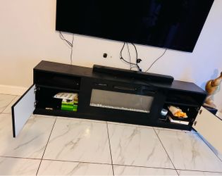 Fireplace with remote for heating and lighting
