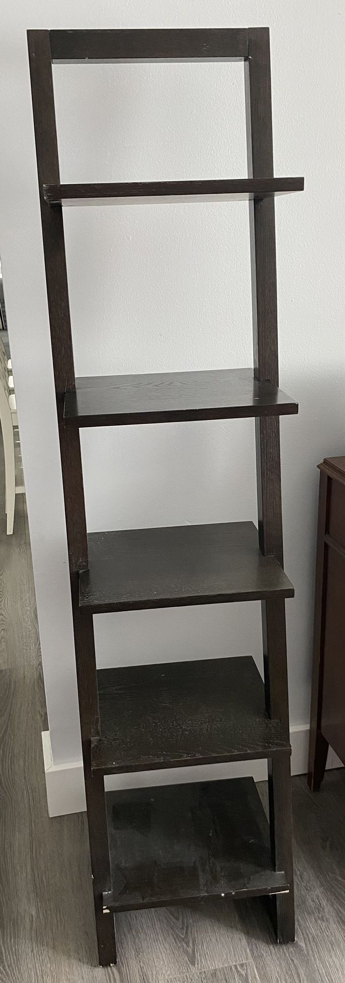 Tiered brown stand alone ladder shelf