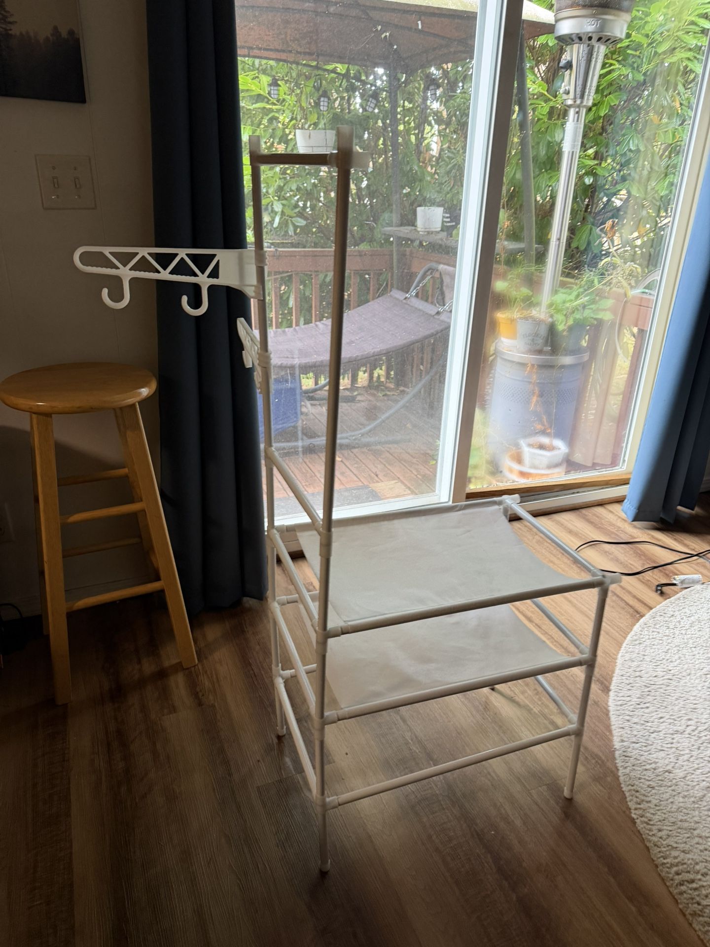 Efficiently organize your space with this sleek white home storage organizer