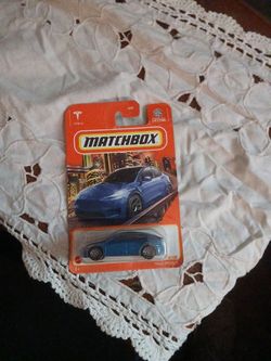 Tesla 3/100 y blue matchbox car