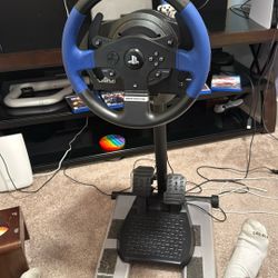 Steering Wheel And Pedals And Fenatec Stand.