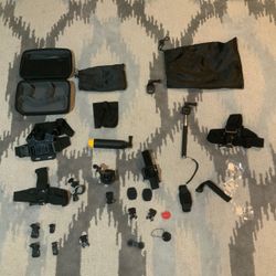 A bunch of gopro accessories and a case. Basically no wear on anything.