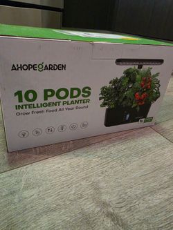 Unopened Indoor Smart Garden with extra herbs