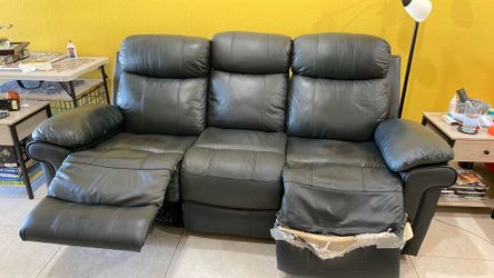 Dual seat reclining sofa