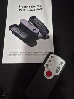 Electric seated pedal exerciser