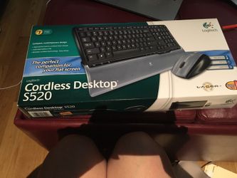 Logitech S520 cordless Keyboard and mouse. New in original box/ never opened