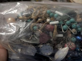 gallon bag full of junk jewelry