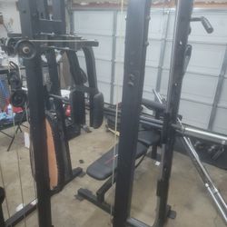 Smith Machine And Dumbell Set 4 Bench Bars 2 Curls Bars  Total Of (1,215Lbs) Of Weight