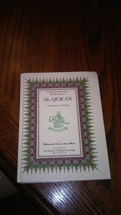 Al quaran translation book