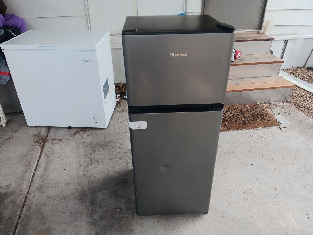 Refrigerator And A Chest Freezer 