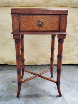 Ethan Allen Hollywood Regency style burl walnut nightstand with a single drawer and faux bamboo legs