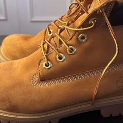 men’s timberlands size 6 , women’s size 8