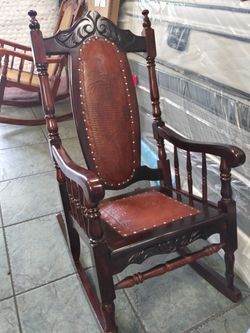 New wood and Lather Rocking Chair $ 275.00 each