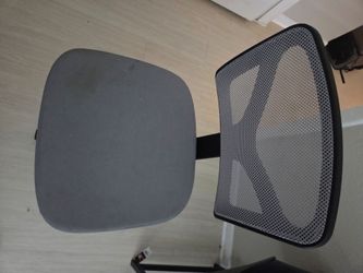 Office chair and small solo desk.