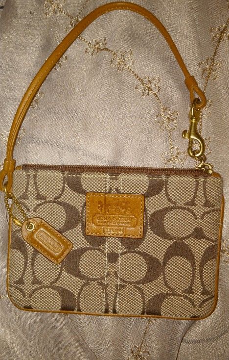 Signature Coach Wristlet