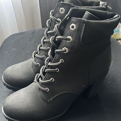 Woman’s Lace Up Booties