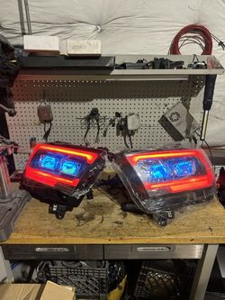 Brand new In Box (19-24) RAM 1500 ALPHAREX LUXX HEADLIGHTS