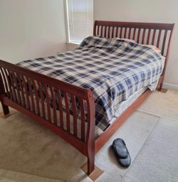 Queen size wooden bed