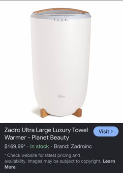 Zadro 20-Liter Large Towel Warmer Bucket with a bamboo handle.