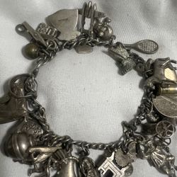 EndedEnded Vintage Sterling Silver Charm Bracelet With 30 Charms some 