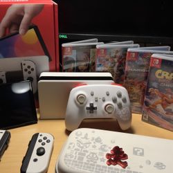 Nintendo Switch OLED + 4 Games + Wired Controller + Carrying Case 