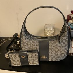 Coach Purse and wristlet set. 