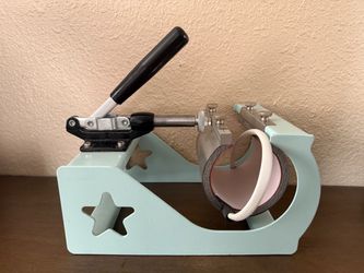 Heat press (greenish blue) with cup press