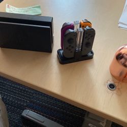 Nintendo Switch Tv Port and 4 Joycon Controllers W/ charging port