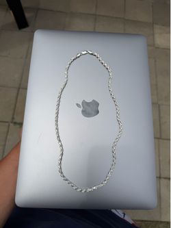 Silver rope diamond cut chain 22in
