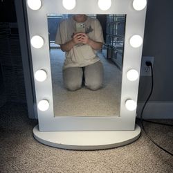 Vanity With Dimming Lights And Outlet 