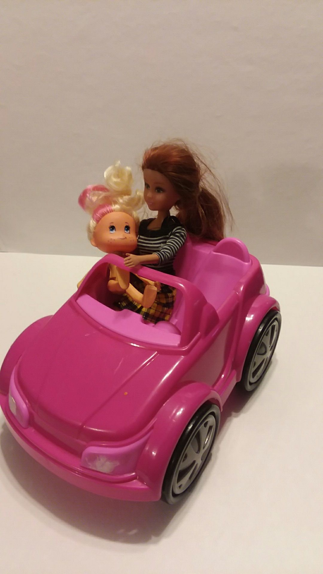 2 Dolls and a car