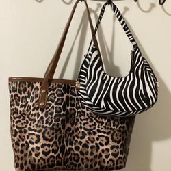 Brand new animal print purses.