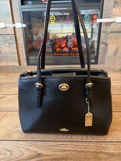 Coach cross grain leather turn lock purse