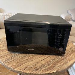 Samsung MC11K7035CG Black Stainless Steel Convection Microwave oven 1.1 Cu.Ft.