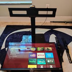 32" TCL 1080 ROKU TV With Standing TV Mount
