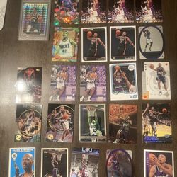 Lot Of 60 Milwaukee Bucks Cards. The highlight of this lot is a Giannis Antetokounmpo 2019 Panini Mosaic Stained Glass PSA 10