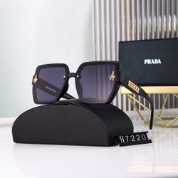 WOMENS PRADA CIRCLE SUNGLASSES