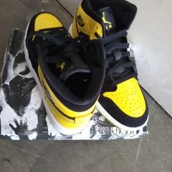brand new, Real air Jordan 1 Mid, black and yellow.  with box, youth 5 or women's size 7