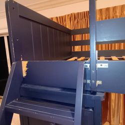Kids raised bunk bed with desk and drawers