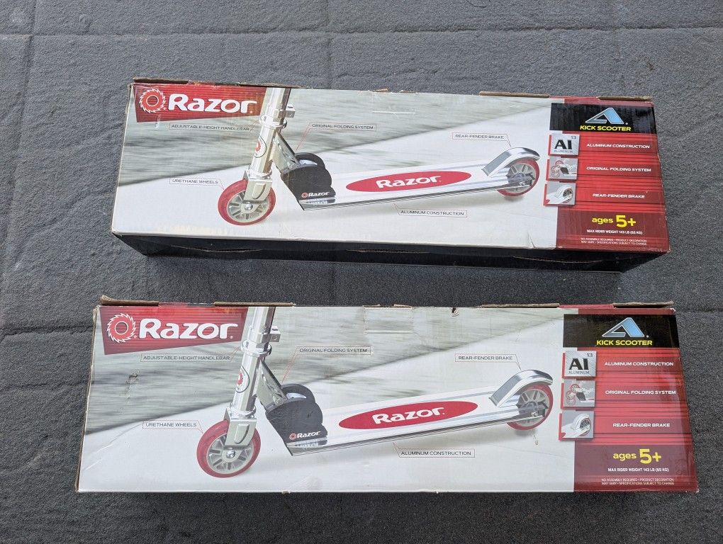 2 New In Box Razor scooter Aluminum folds up and Urethane wheels