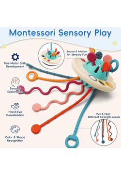 Encourage fine motor skills and hand-eye coordination with this Montessori sensory pull toy. Bright teal, coral, and peach strands offer tactile explo