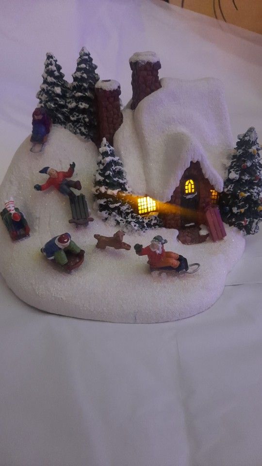 Thomas Kinkade
Painter of Light Christmas
The Sleigh Ride Light Up House Village