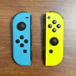 Nintendo Switch Joy-Cons (Blue + Yellow)