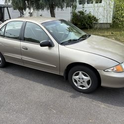2001 Chevrolet Cavalier Beige Tan 4 door 2.2 model with Low miles 122,000 miles original owner.     Honda Toyota Hyundai Kia Lexus Ford Truck weights
