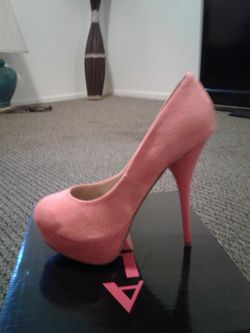 Orange shoes doesn't show well in picture never used