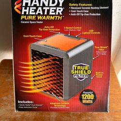 BRAND NEW HANDY HEATER SEALED IN BOX 