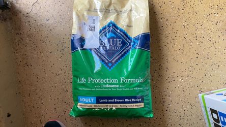 New Blue buffalo lamb dinner dog food-15lb bag and 8 cans