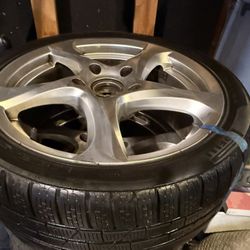 4 Pirelli Snow Tires, And Rims Came Off A Porsche 